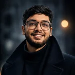 Portrait of MD Laden Islam, Founder and CEO of OveliTHub, wearing glasses against a dark background