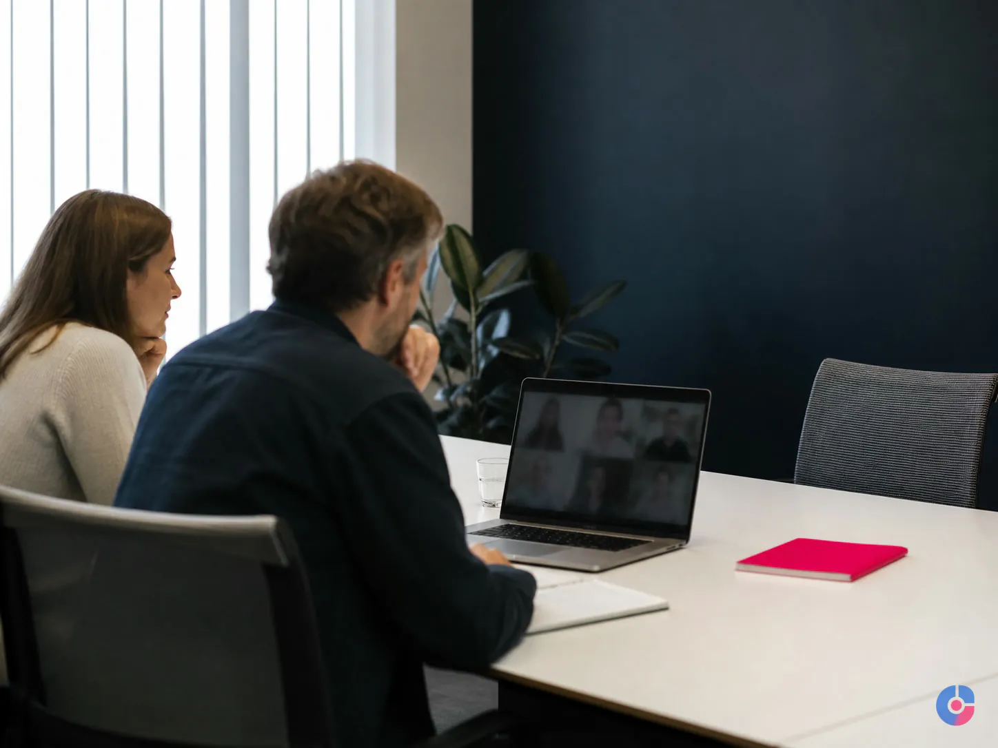 Agency delivery lead running a check-in call with the remote production team