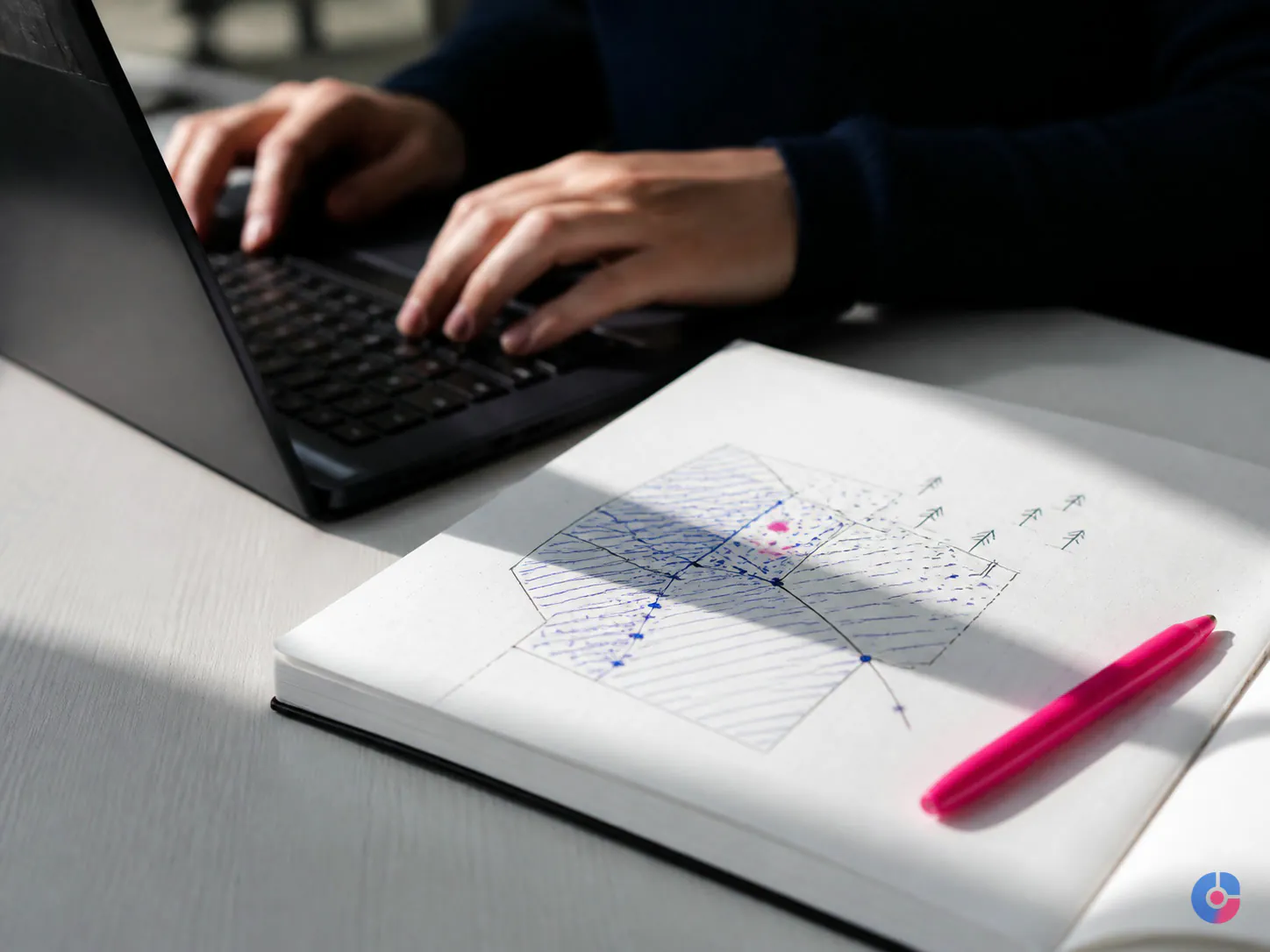 Close-up of a field mapping diagram sketched beside a keyboard during CRM data planning