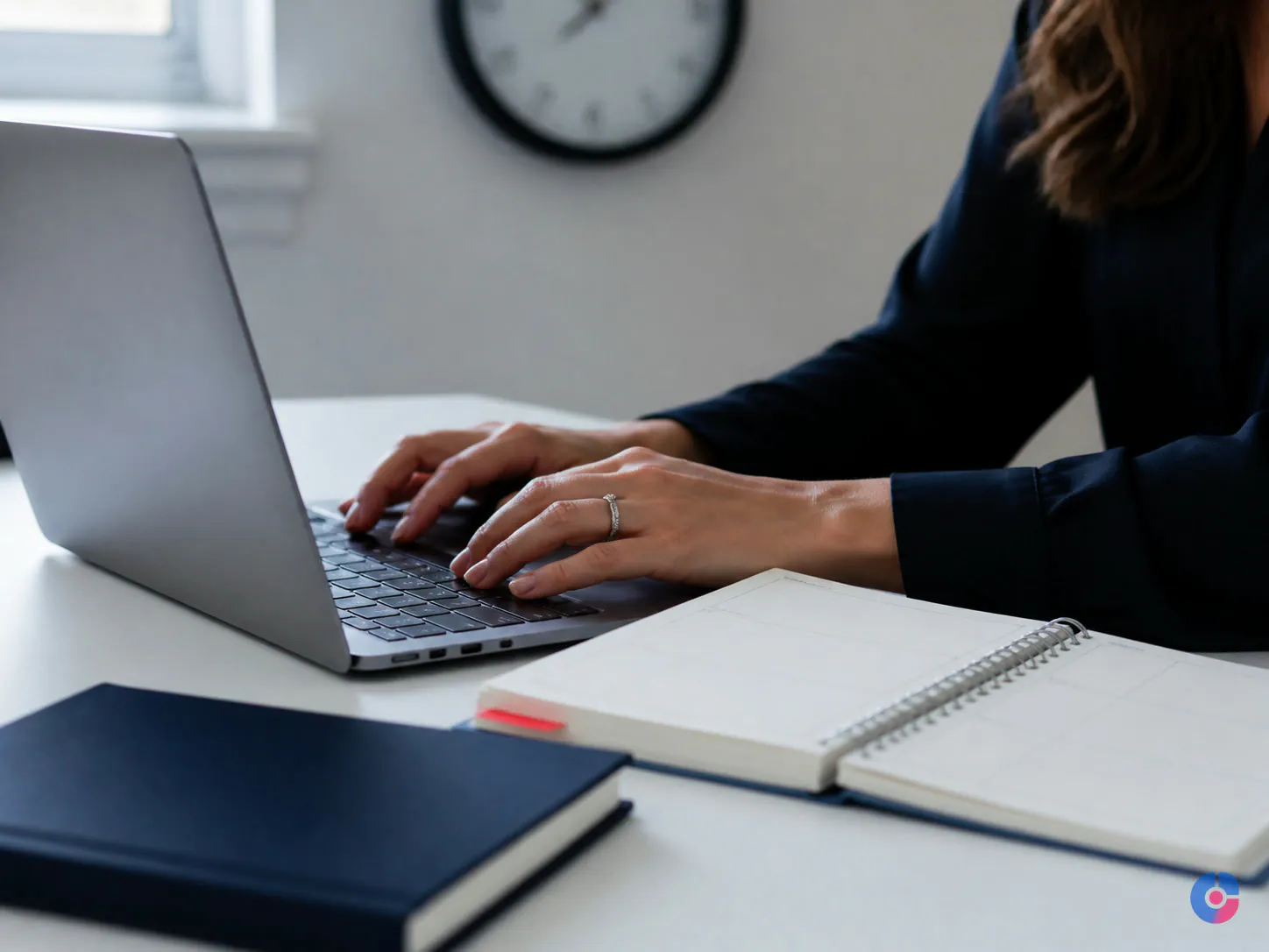 Coordinator scheduling interviews at a desk to reduce candidate waiting time