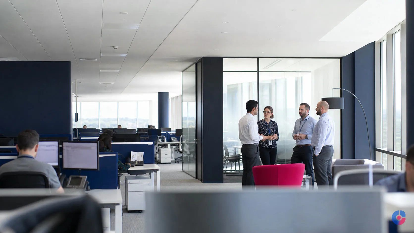Offshore delivery team working in a modern open-plan office in Bangladesh