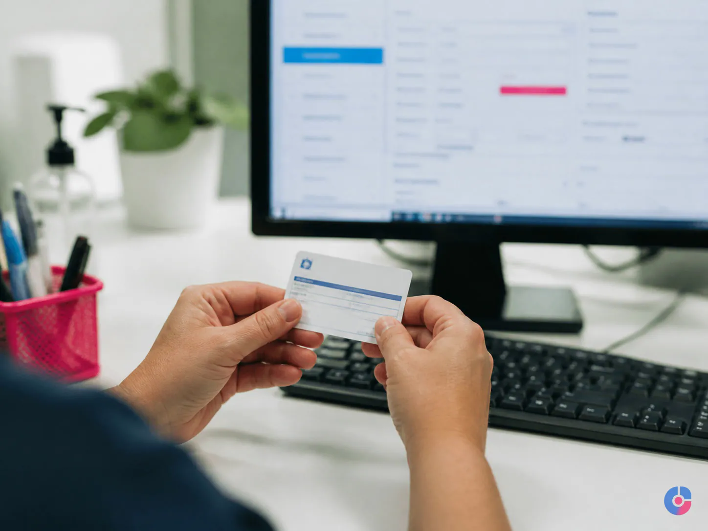 Front desk hands verifying insurance details during patient registration